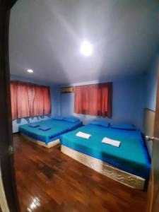 Postel nebo postele na pokoji v ubytování สถานตากอากาศบางปู สมุทปราการ Bang Pu Recreation Center Samut Prakan