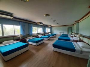 Postel nebo postele na pokoji v ubytování สถานตากอากาศบางปู สมุทปราการ Bang Pu Recreation Center Samut Prakan
