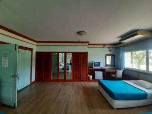 Postel nebo postele na pokoji v ubytování สถานตากอากาศบางปู สมุทปราการ Bang Pu Recreation Center Samut Prakan