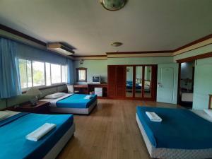 Postel nebo postele na pokoji v ubytování สถานตากอากาศบางปู สมุทปราการ Bang Pu Recreation Center Samut Prakan