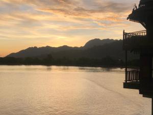 a view of a river with mountains in the background at Langkawi Lagoon Water Villa VIP in Pantai Cenang