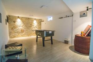 Posezení v ubytování Village holiday apartman with heated pool Maslina