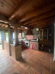 A kitchen or kitchenette at Casa de campo El Midiaju para 8 personas