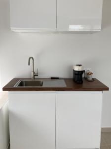 Kuchyň nebo kuchyňský kout v ubytování L'Etape, logement climatisé !