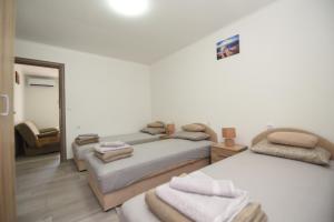 Postel nebo postele na pokoji v ubytování Apartment Miske