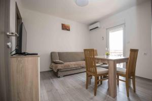 Posezení v ubytování Apartment Miske + 9 fotografií