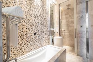 Baðherbergi á Rocase Boutique Hotel Wuxi