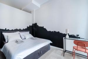 Postel nebo postele na pokoji v ubytování Old Town Spot