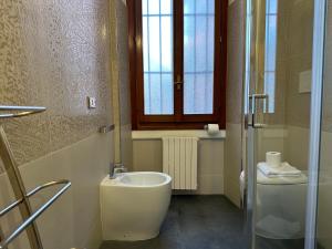 Ванная комната в DolceVita - Gae Aulenti