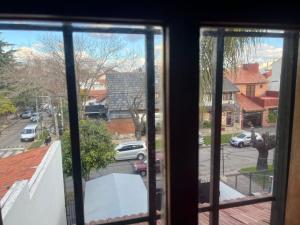 a view of a street from a window at Experiencia Olivos in Florida