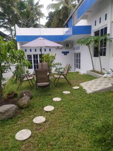 En have udenfor Villa Rumah Kita
