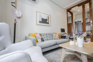 A seating area at Brand new one bedroom apartment located in Chueca