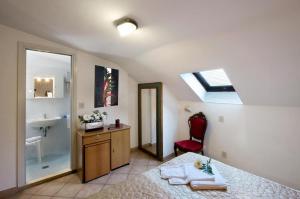 Postel nebo postele na pokoji v ubytování Hotel Roma