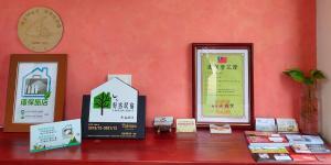 Certifikat, nagrada, znak ali drug dokument, ki je prikazan v nastanitvi Yilan B&B - Happy Snail