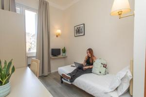 TV a/nebo společenská místnost v ubytování Hotel L'Aretino