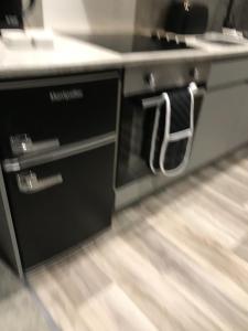 Dapur atau dapur kecil di Sunset Studio Apartments