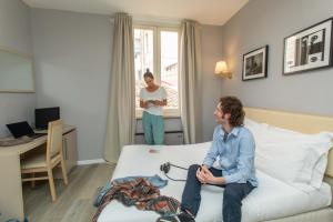 TV a/nebo společenská místnost v ubytování Hotel L'Aretino