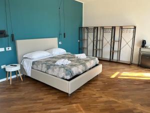 מיטה או מיטות בחדר ב-ATTICO33