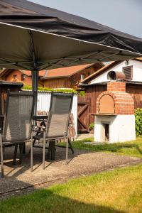 Φωτογραφία από το άλμπουμ του Ferienhaus Blick Falkenstein σε Lindberg