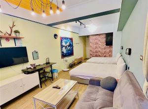TV a/nebo společenská místnost v ubytování Mini House