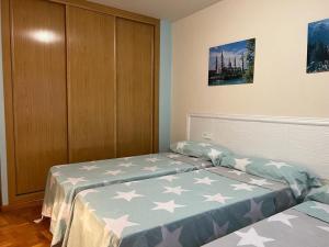 Postel nebo postele na pokoji v ubytování Apartamento Posada de Llanes