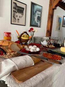 a table with a tray of food on a table at Hotel Berati in Berat +74 photos