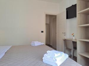 Postel nebo postele na pokoji v ubytování Maresol Residence