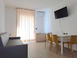 TV a/nebo společenská místnost v ubytování Maresol Residence