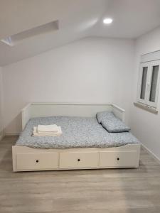 Postel nebo postele na pokoji v ubytování Sãozinha Guest House