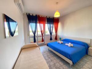 Postel nebo postele na pokoji v ubytování Imperiale Apartment