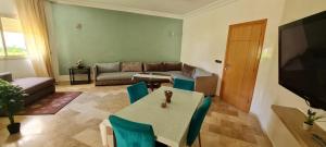 Χώρος καθιστικού στο Bel appartement Savannah Beach