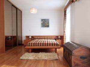 a room with a bed and a table in it at Casa da Estrela in Seia