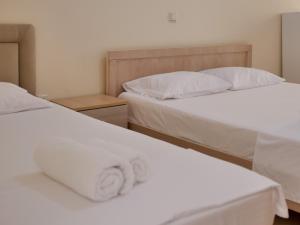 Postel nebo postele na pokoji v ubytování Bodini's Rooms