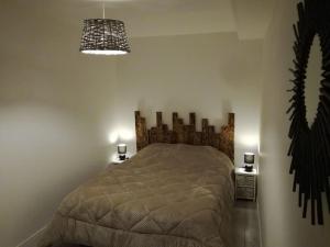 Ένα ή περισσότερα κρεβάτια σε δωμάτιο στο La Maison Des Sources ( wifi )