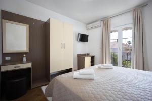 Postel nebo postele na pokoji v ubytování Villa Marija