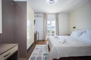 Postel nebo postele na pokoji v ubytování Villa Marija