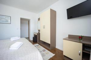 Postel nebo postele na pokoji v ubytování Villa Marija