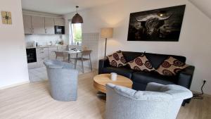 Köök või kööginurk majutusasutuses Haus-zum-Leuchtturm-Whg-03