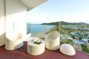 a living room with a view of the ocean at Hard Rock Hotel Ibiza in Playa d'en Bossa
