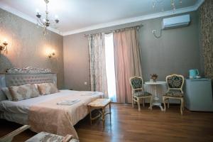 Katil atau katil-katil dalam bilik di Borjomi Classic Hotel