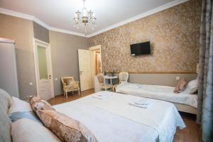 Katil atau katil-katil dalam bilik di Borjomi Classic Hotel