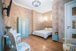 Katil atau katil-katil dalam bilik di Borjomi Classic Hotel