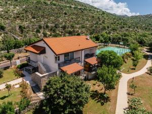 an aerial view of a house with a swimming pool at Veladrion Adults Exclusive Boutique Resort in Senj