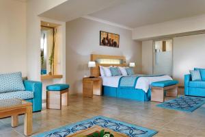 Posteľ alebo postele v izbe v ubytovaní Movenpick Waterpark Resort & Spa Soma Bay