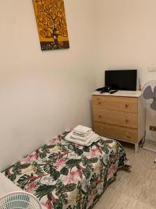 Posteľ alebo postele v izbe v ubytovaní 4 Season B&B Roma