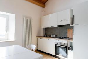 Nhà bếp/bếp nhỏ tại Tana a 5 STELLE +25 ảnh