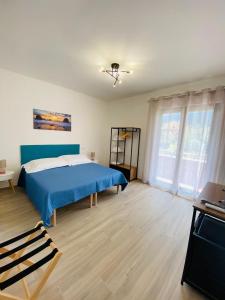 Postel nebo postele na pokoji v ubytování Guest House Tramontana 19