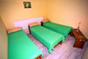 Voodi või voodid majutusasutuse Hotel SOREA ĎUMBIER toas