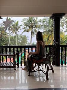 A balcony or terrace at SAND BEACH HOUSE VARKALA