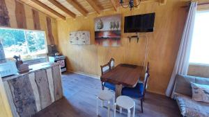 Kuchyň nebo kuchyňský kout v ubytování Cabañas & Habitaciones Del Alto